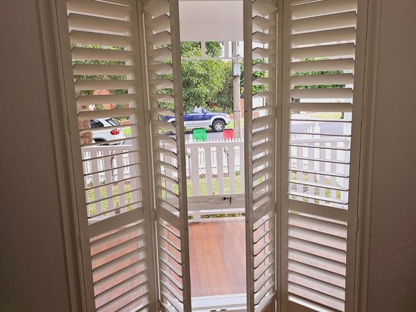 Bi-fold Corner Plantation Shutters